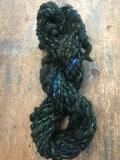 Evenrude 20 yards wavy sparkly forest green art yarn