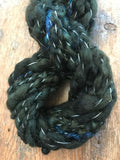 Evenrude 20 yards wavy sparkly forest green art yarn