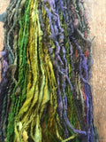 Mardi Gras - 50 yards nubbly handspun southdown wool art  yarn purple green gold