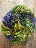 Mardi Gras - 50 yards nubbly handspun southdown wool art  yarn purple green gold