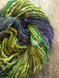 Mardi Gras - 50 yards nubbly handspun southdown wool art  yarn purple green gold