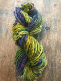 Mardi Gras - 50 yards nubbly handspun southdown wool art  yarn purple green gold