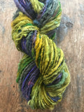 Mardi Gras - 50 yards nubbly handspun southdown wool art  yarn purple green gold