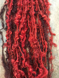 Blood Moon, orange/red overdyed Lincoln wool lockspun yarn, 20 yards