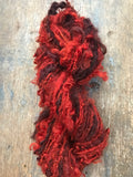 Blood Moon, orange/red overdyed Lincoln wool lockspun yarn, 20 yards