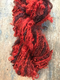 Blood Moon, orange/red overdyed Lincoln wool lockspun yarn, 20 yards