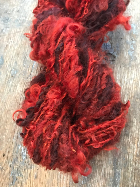 Blood Moon, orange/red overdyed Lincoln wool lockspun yarn, 20 yards