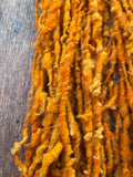 Ray of Sunshine - nubbly orange handspun southdown wool art  yarn