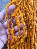 Ray of Sunshine - nubbly orange handspun southdown wool art  yarn