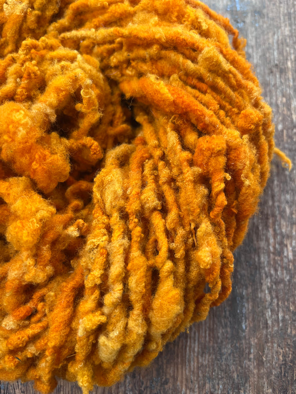 Ray of Sunshine - nubbly orange handspun southdown wool art  yarn