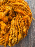 Ray of Sunshine - nubbly orange handspun southdown wool art  yarn