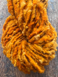 Ray of Sunshine - nubbly orange handspun southdown wool art  yarn