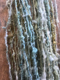 Indigo and Black Walnut curls - handspun yarn, 50 yards