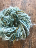 Indigo and Black Walnut curls - handspun yarn, 50 yards