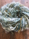 Indigo and Black Walnut curls - handspun yarn, 50 yards