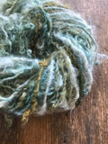 Indigo and Black Walnut curls - handspun yarn, 50 yards