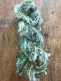 Indigo and Black Walnut curls - handspun yarn, 50 yards