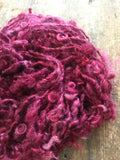 Merrily We Roll Along, burgundy curly 20 yards handspun yarn