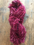 Merrily We Roll Along, burgundy curly 20 yards handspun yarn