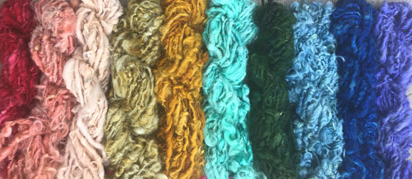 handspun curly yarn in a rainbow of color