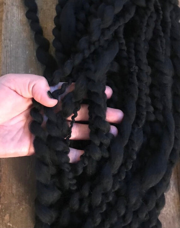 Serpentine yarn 40 yards wavy black merino art yarn