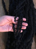 Serpentine yarn 40 yards wavy black merino art yarn